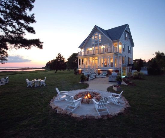 Beachy Stone Fire Pit in Backyard