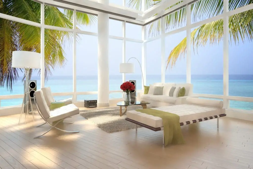 http://www.blucarrot.com/wp-content/uploads/2015/06/Interior-Apartment-Design-Feature-View-Beach-Bay-Window-Together-White-Tufted-Sofa-And-Tufted-Sofa-Bench-Also-Modern-Tufted-Chair-With-Chrome-Base-As-Well-As-Triangular-Coffee-Table.jpg