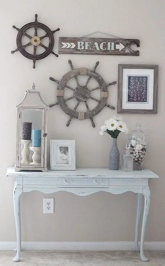 ship wheels and beach sign